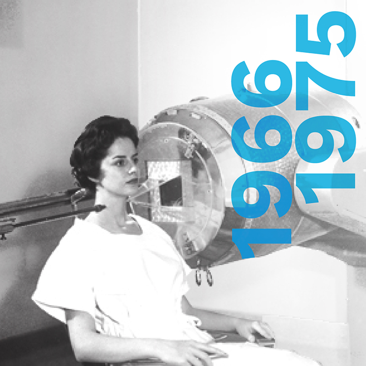 Marking
the decade 1966 to 1975. A woman in a hospital gown sits upright in an exam
chair. Medical imaging equipment surrounds her. A long tube points to the
right side of her neck. On the other side is a large round metal device.