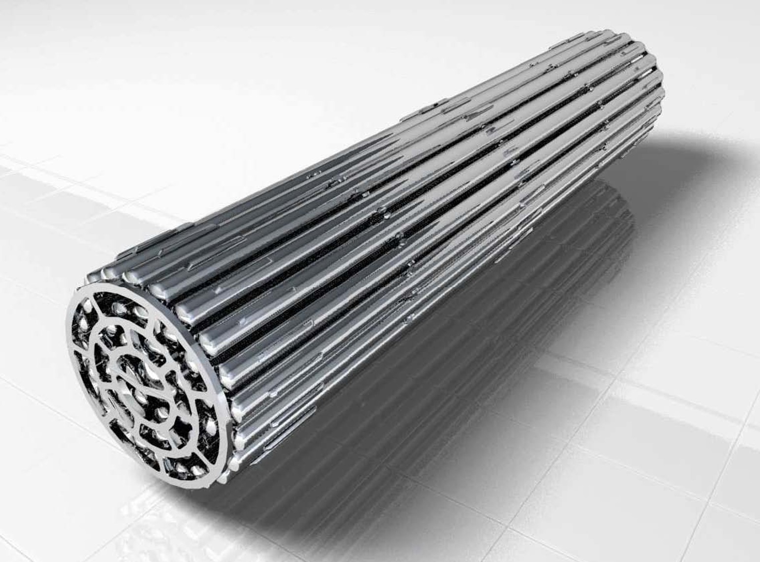 A silver cylindrical fuel bundle is shown.