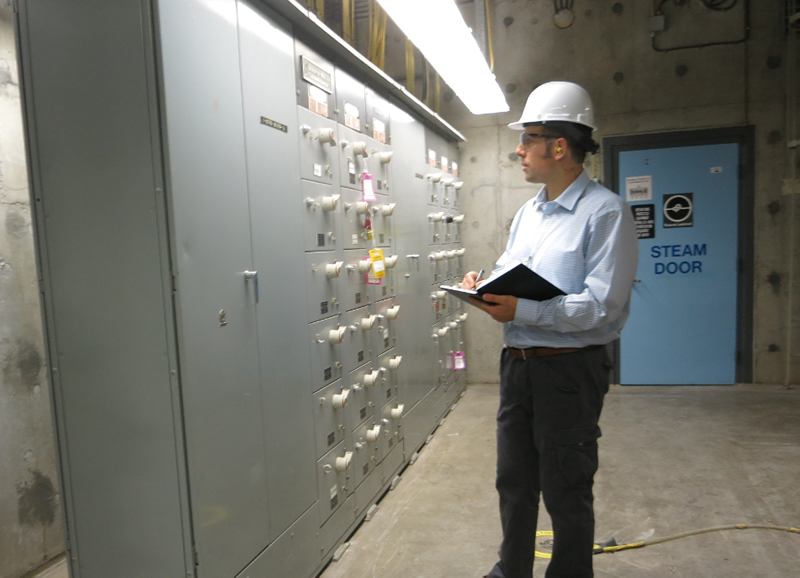 A CNSC expert during inspection of the seismic qualification at a Canadian nuclear power plant