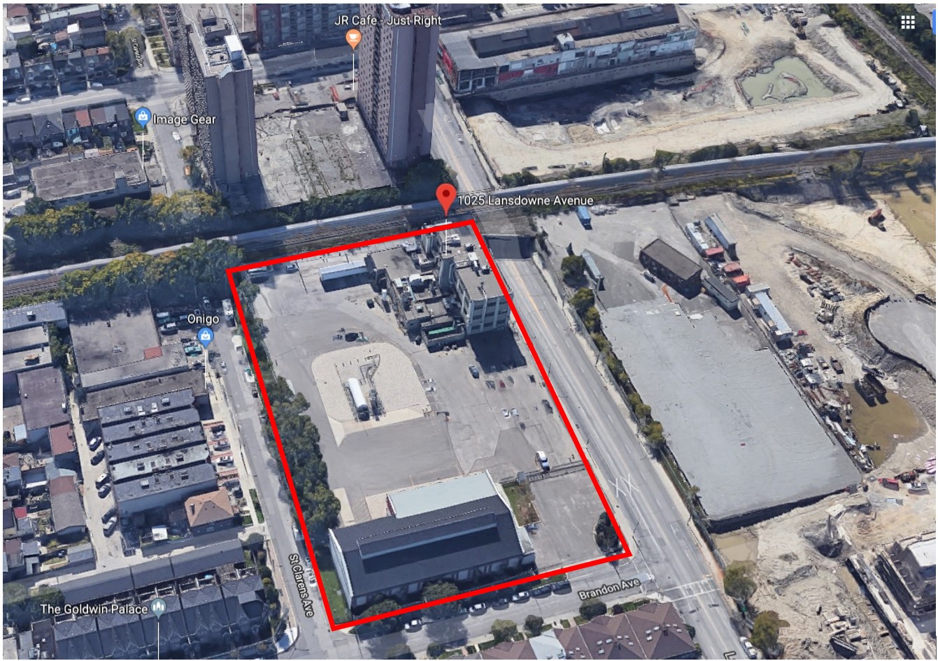 The facility premise, shown in an aerial photo and highlighted in a rectangle, has a few small buildings.