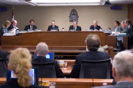 Commission meeting involving CNSC staff