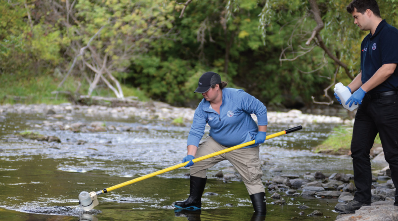 Figure 2: CNSC environmental program officers collect samples for analysis