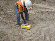 Photograph of a portable gauge in use. 