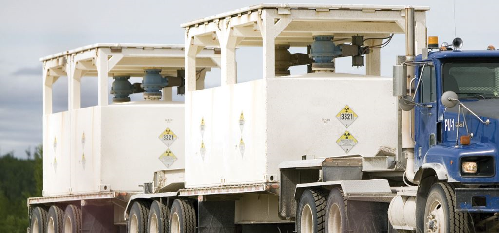 Ore slurry being transported to the Key lake Operaiton's mill - Source: Cameco. This photograph shows ore slurry being transported in special containers to the Key Lake Operation's mill for processing.