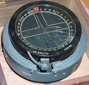 A compass from a Lancaster Bomber, containing radium-painted markings.