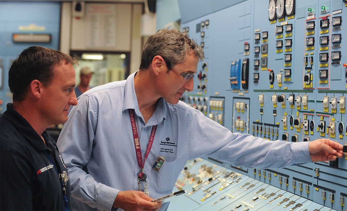 A CNSC inspector and a worker from NB Power at the Point Lepreau Nuclear Generating Station, New Brunswick