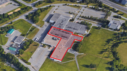 An aerial photo of the facility. The facility is immediately surrounded by greenspace surrounding the facility, located in an industrial area of Kanata.